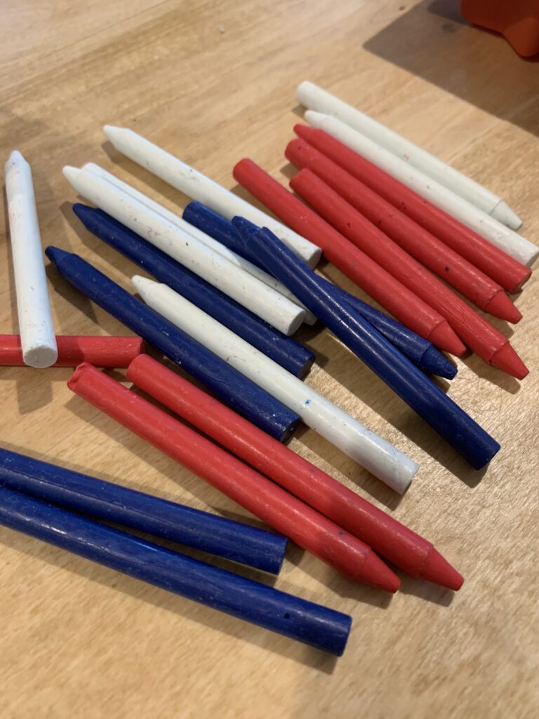 red white and blue crayons