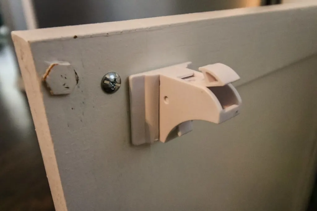 eco baby cabinet locks installed on cabinet door