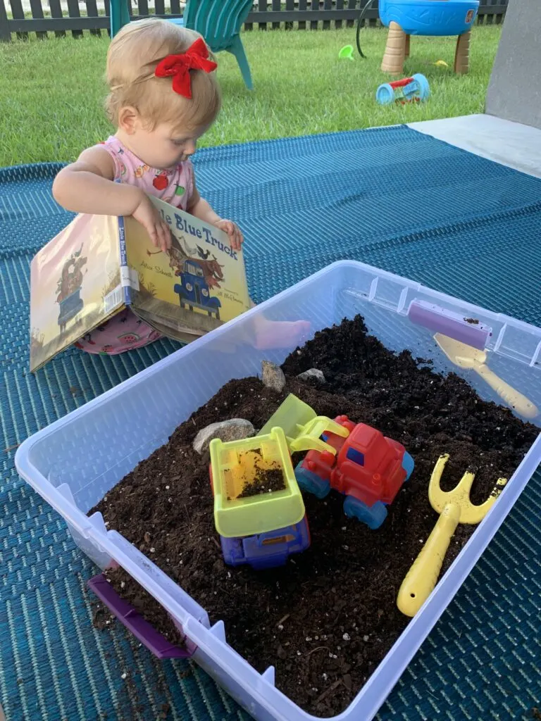 little blue truck sensory bin