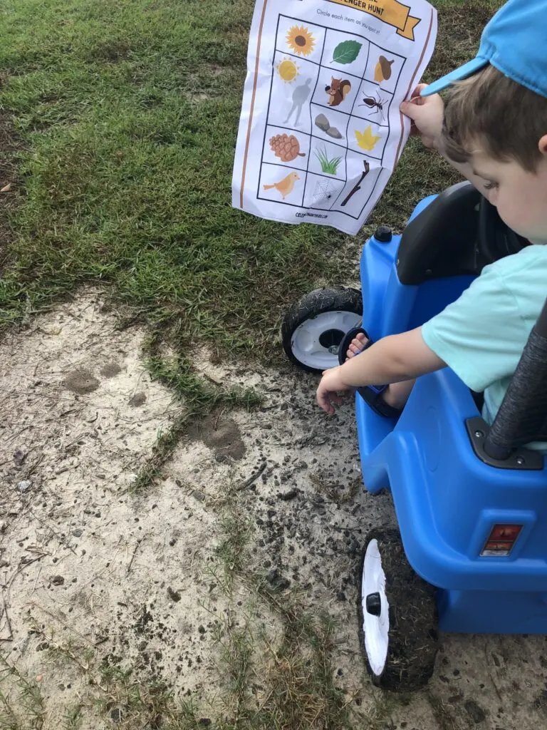 toddler on a fall nature hunt