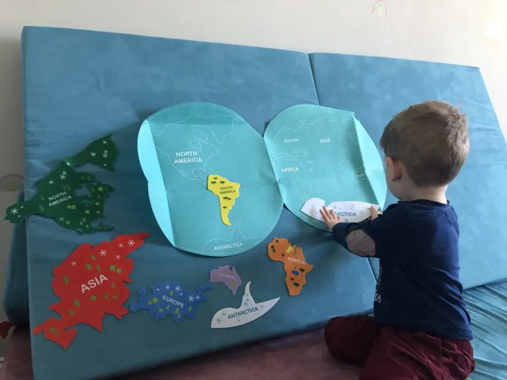 sticking felt shapes to a nugget couch