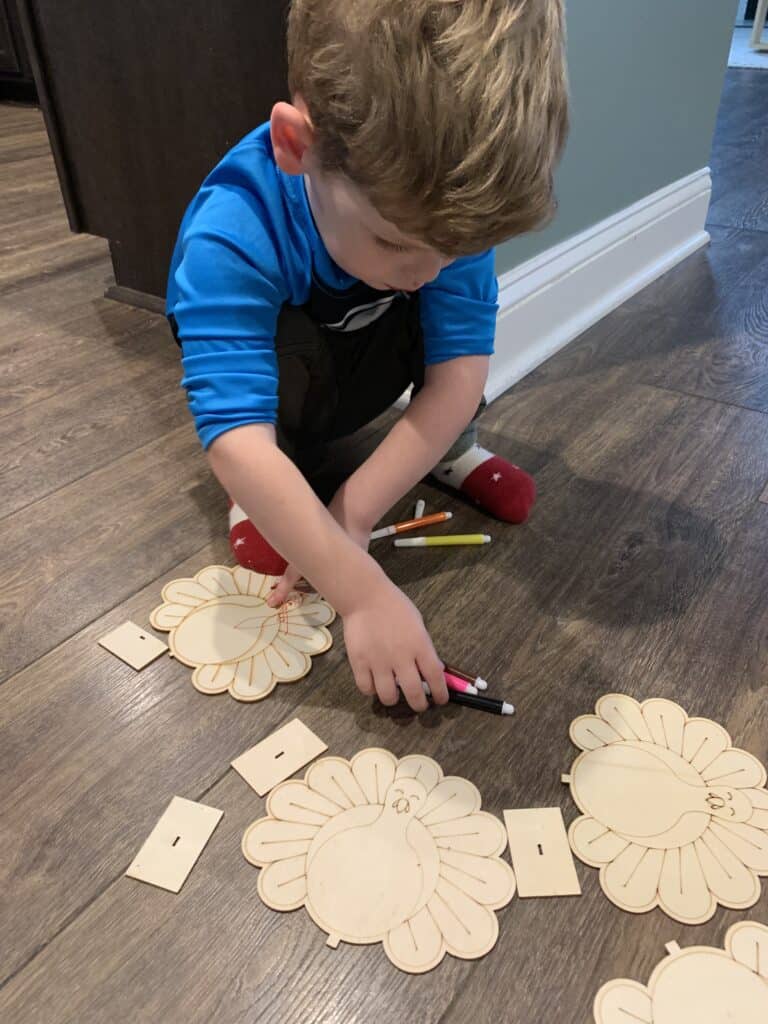 toddler coloring wooden turkeys stacking turkeys from yearcheer thanksgiving box