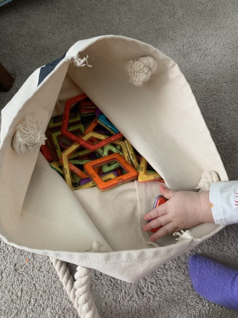 magnetic tiles in a tote bag