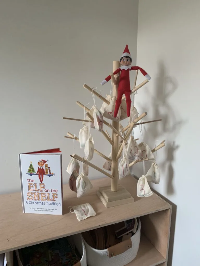 elf on the shelf in a tree