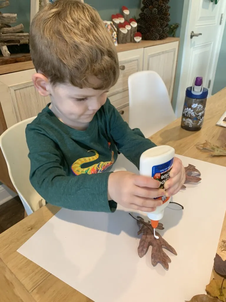 gluing leaves to paper