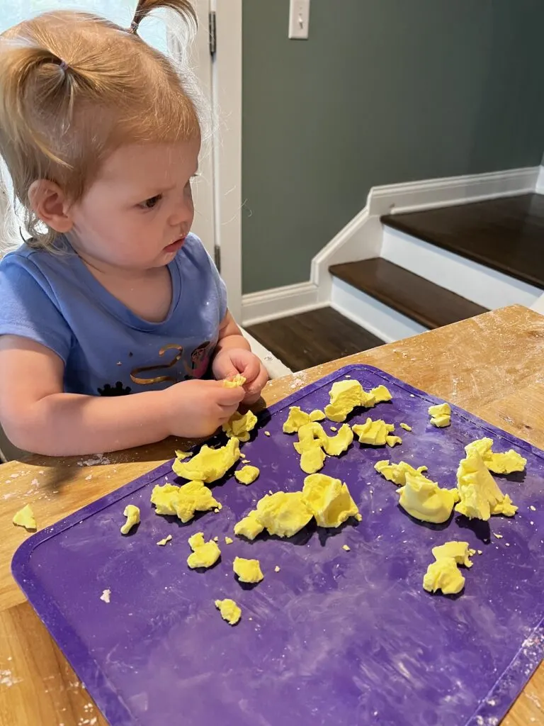 1 year old playing with cloud dough