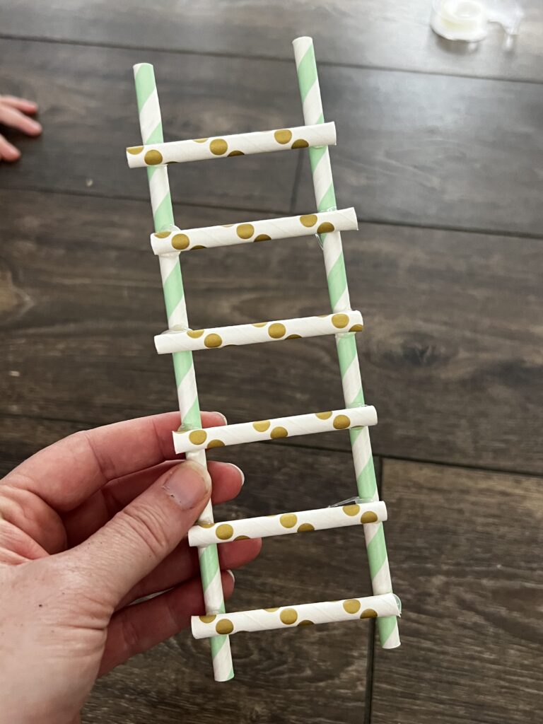 leprechaun ladder made from paper straws and hot glue