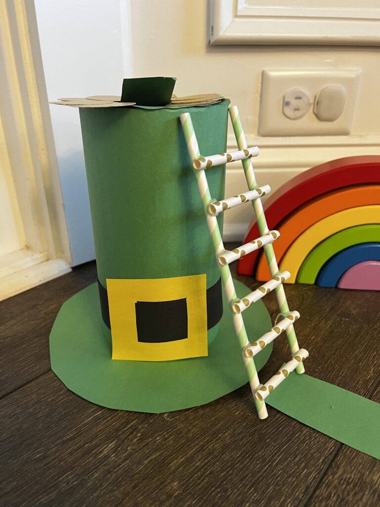 leprechaun trap made from paper and an oatmeal canister