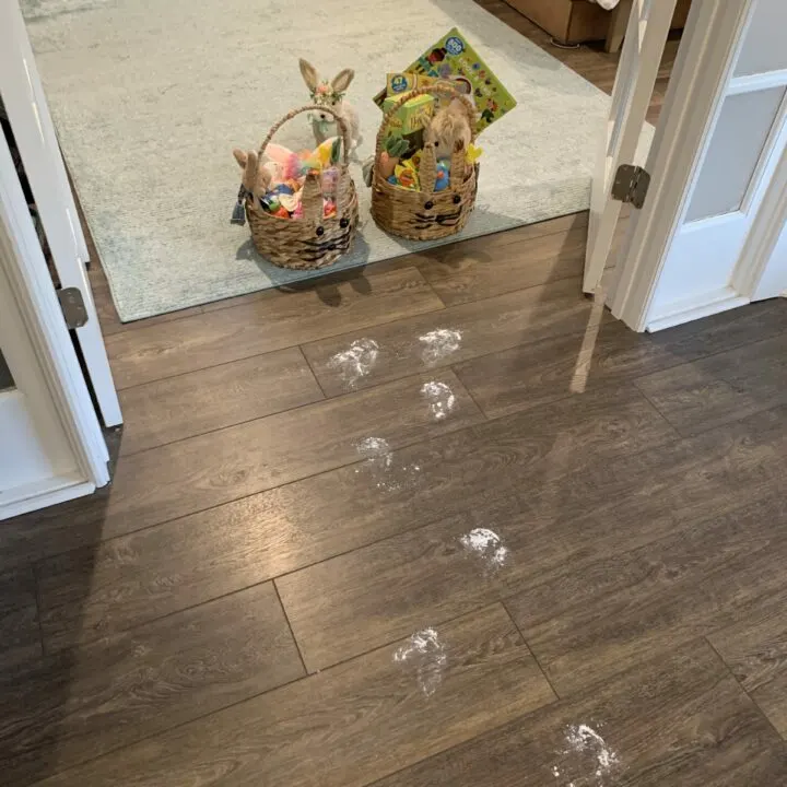 easter bunny footprints leading to easter baskets