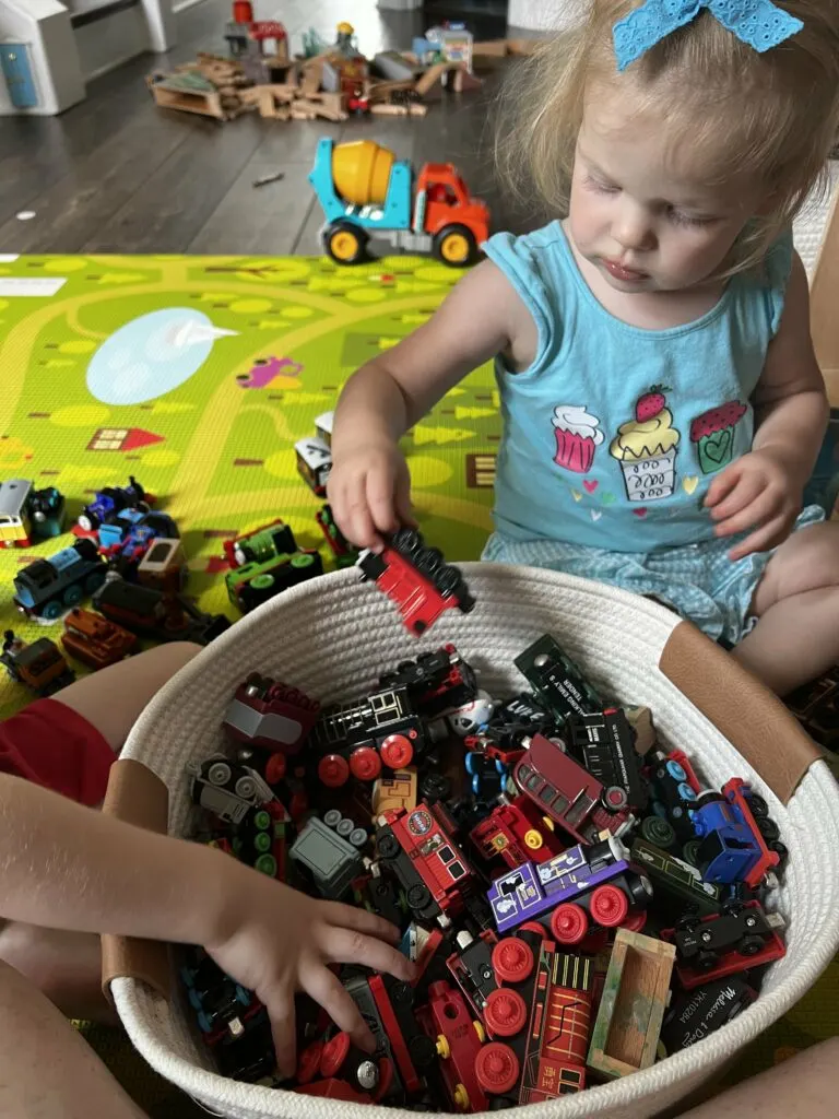 toddlers playing with thomas trains