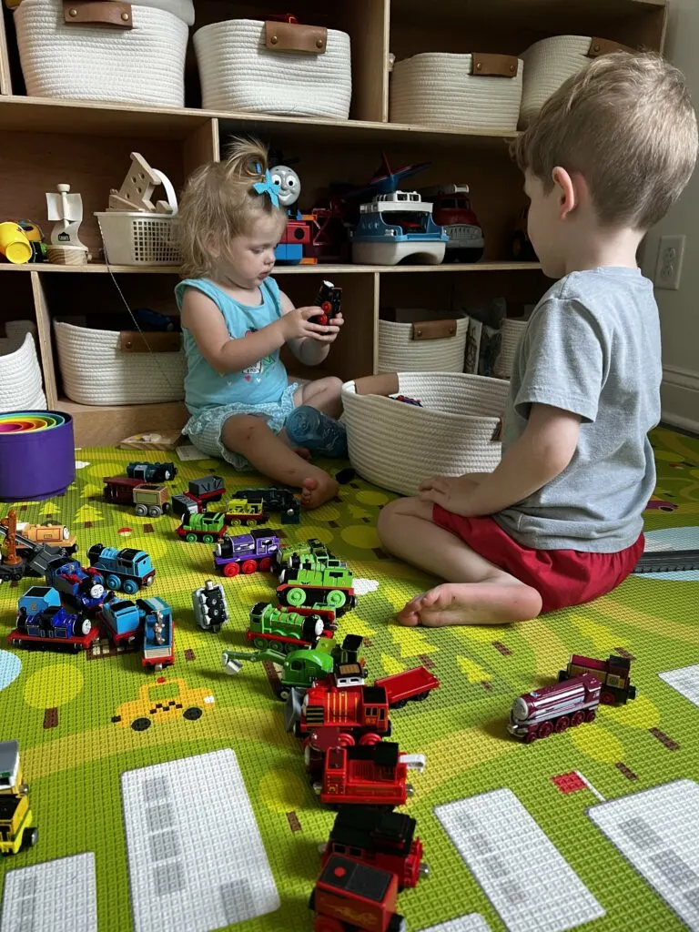 kids sorting thomas the train toys
