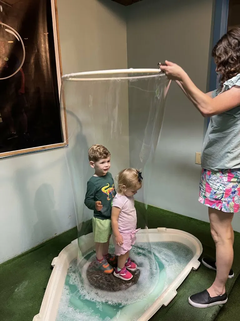 toddlers inside a giant bubble mystery hill
