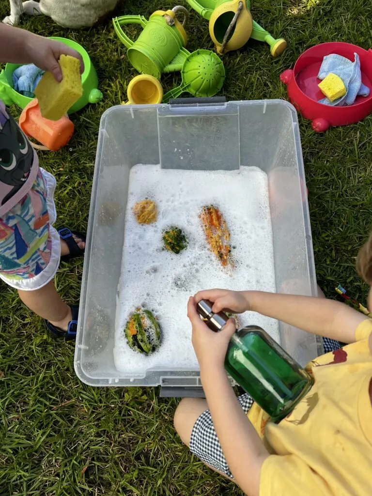 pumpkin wash sensory bin