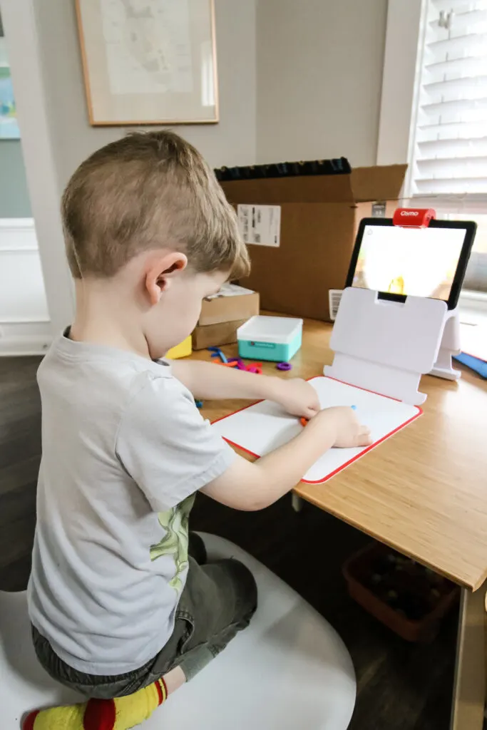 osmo tablet game being used by a preschooler