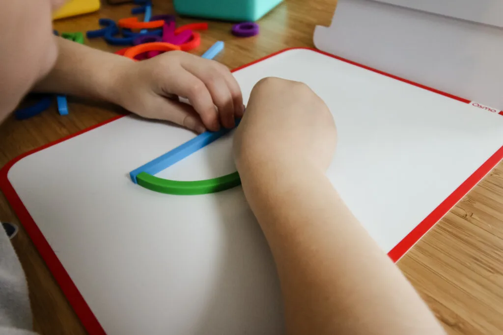 osmo tablet game being used by a preschooler