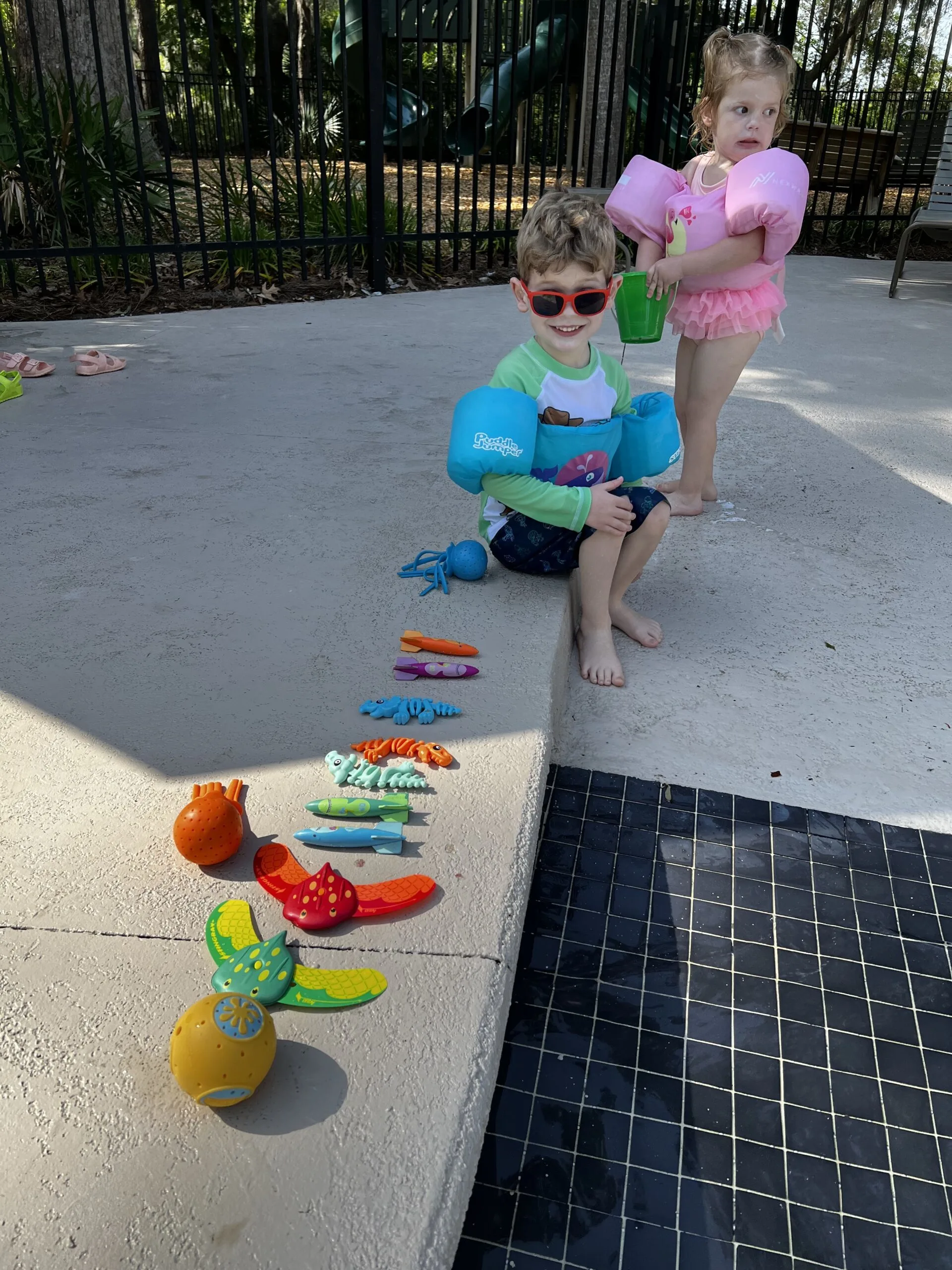 kids with their pool toys