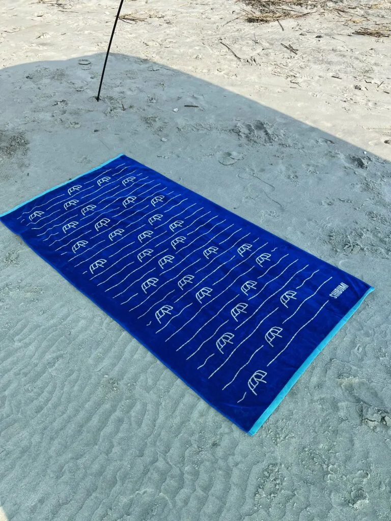 shibumi towel on the beach