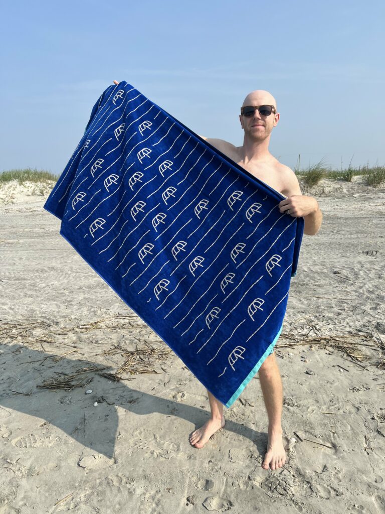 showing front of shibumi beach towel