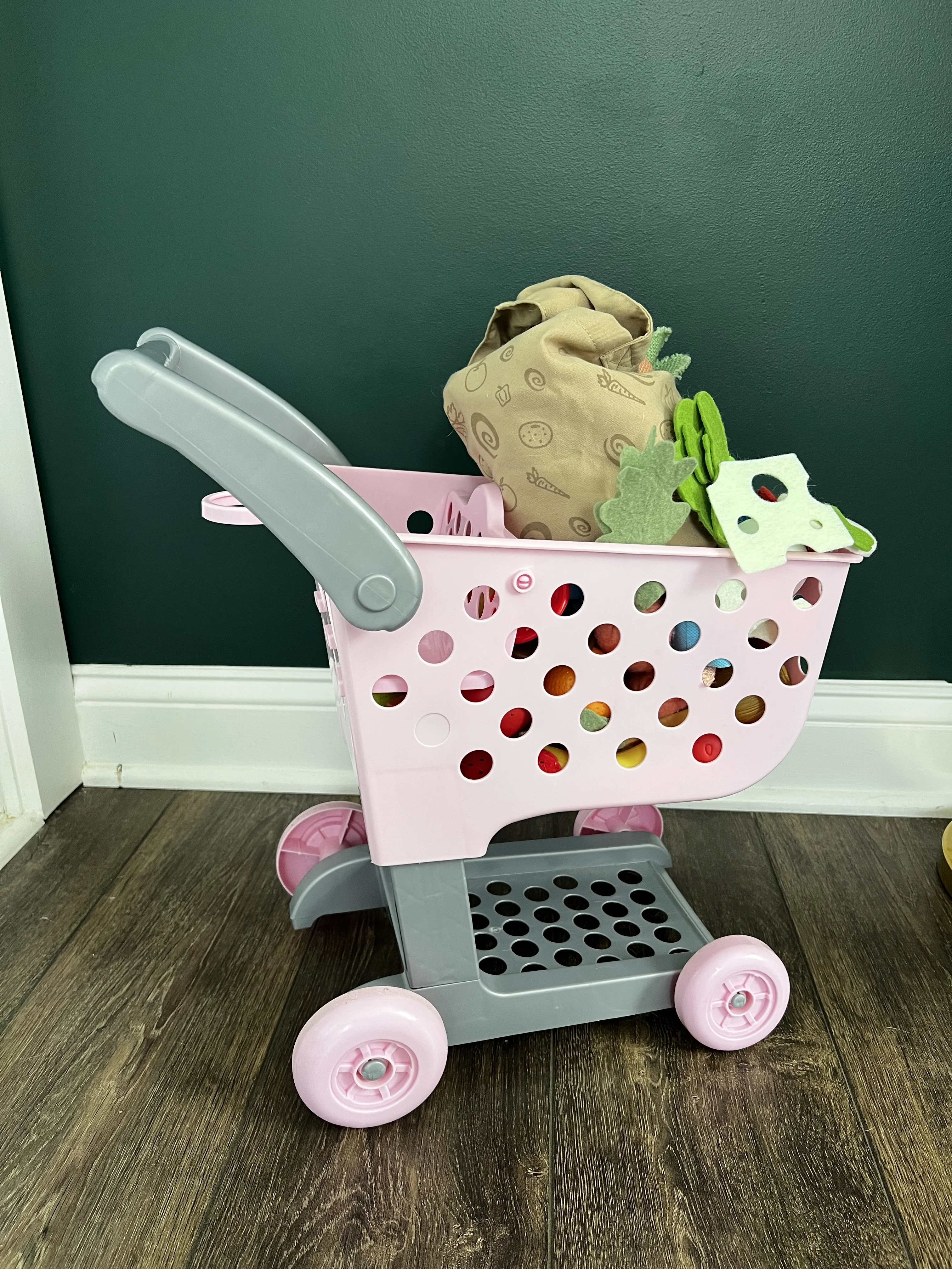 play food in a toy grocery cart