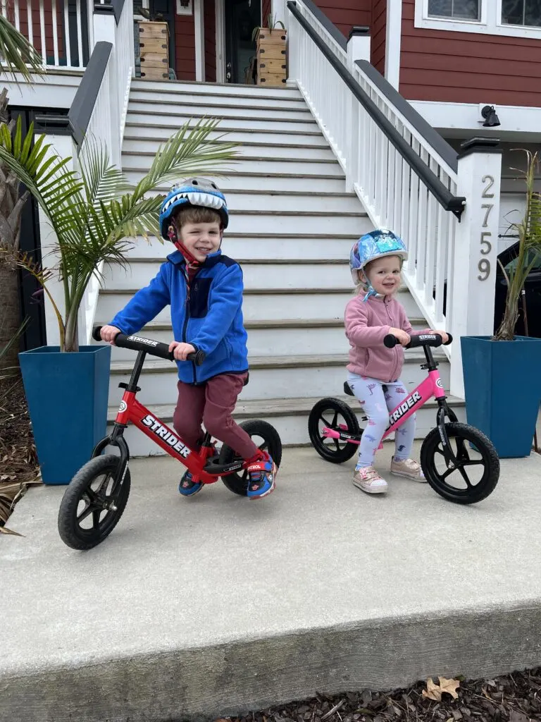 2 year old girl 4 year old boy on balance bikes