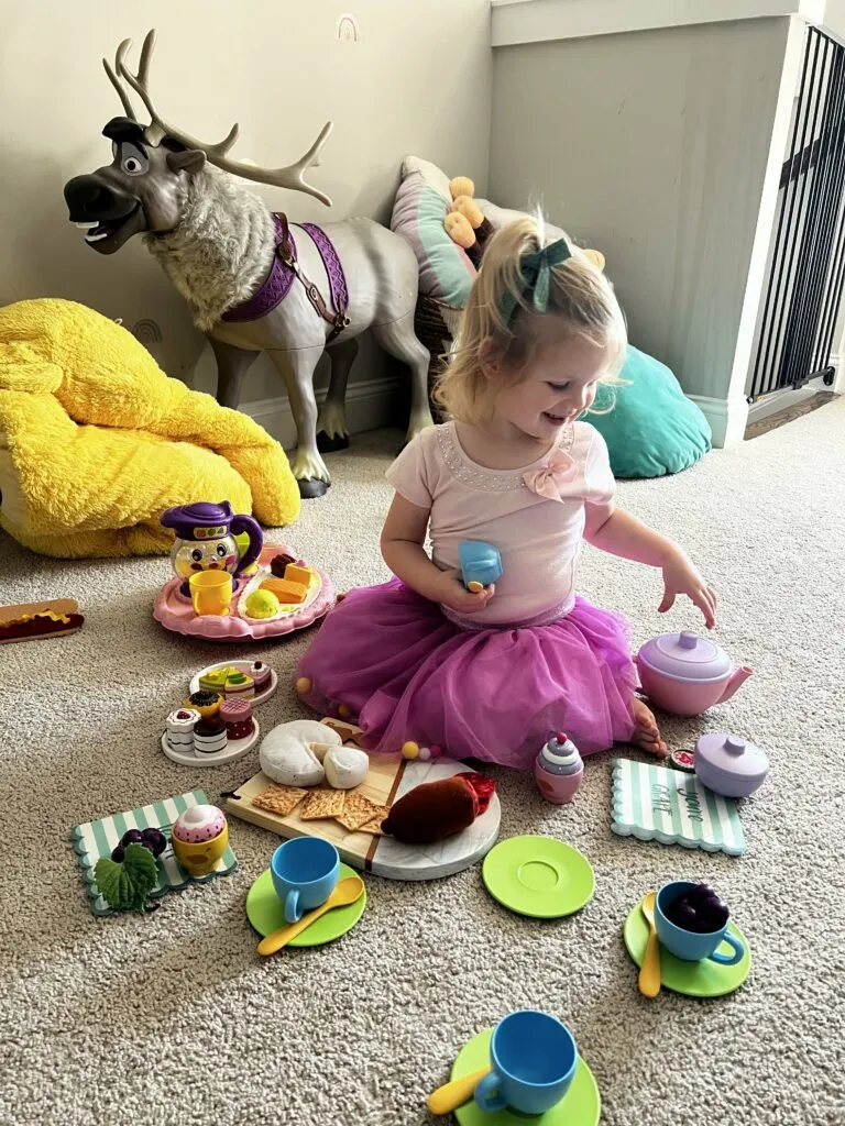 2 year old playing tea party