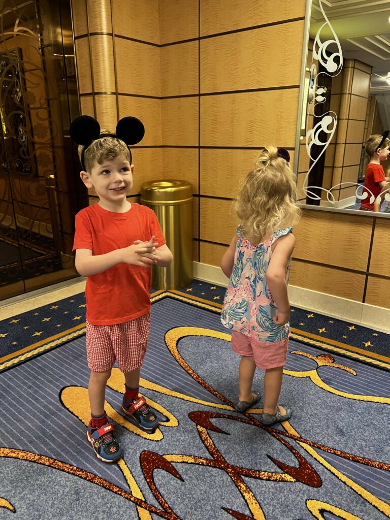 kids in mouse ears on a disney cruise