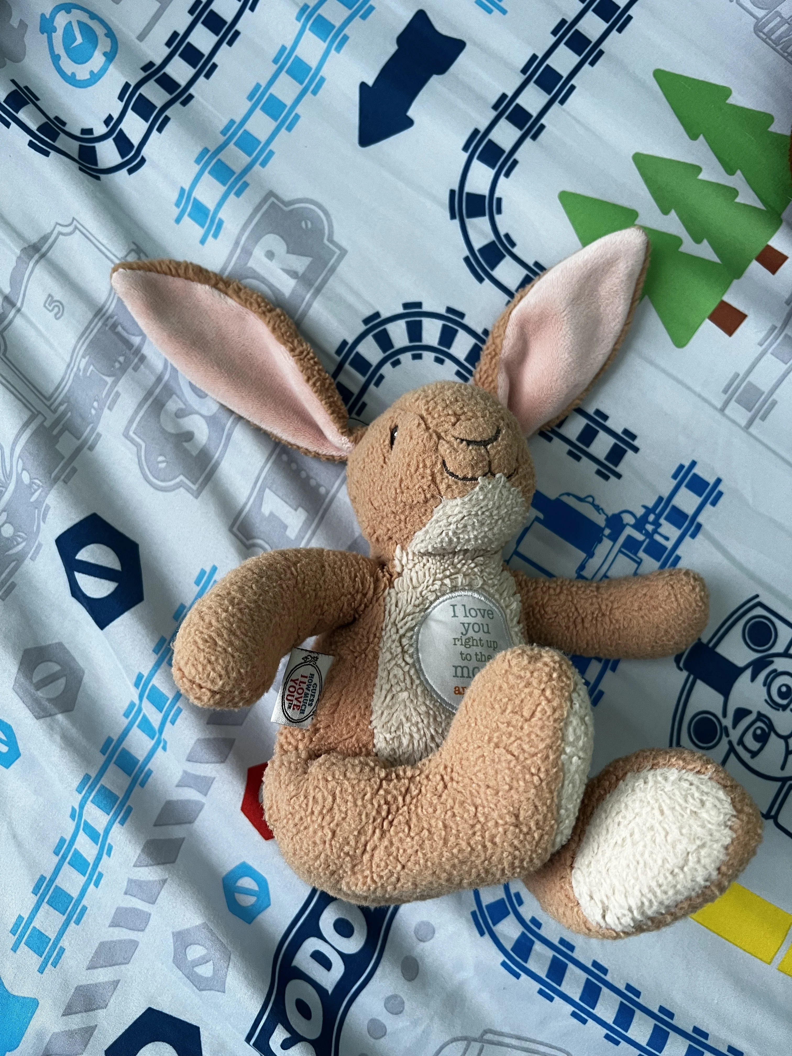 stuffed bunny on a bed