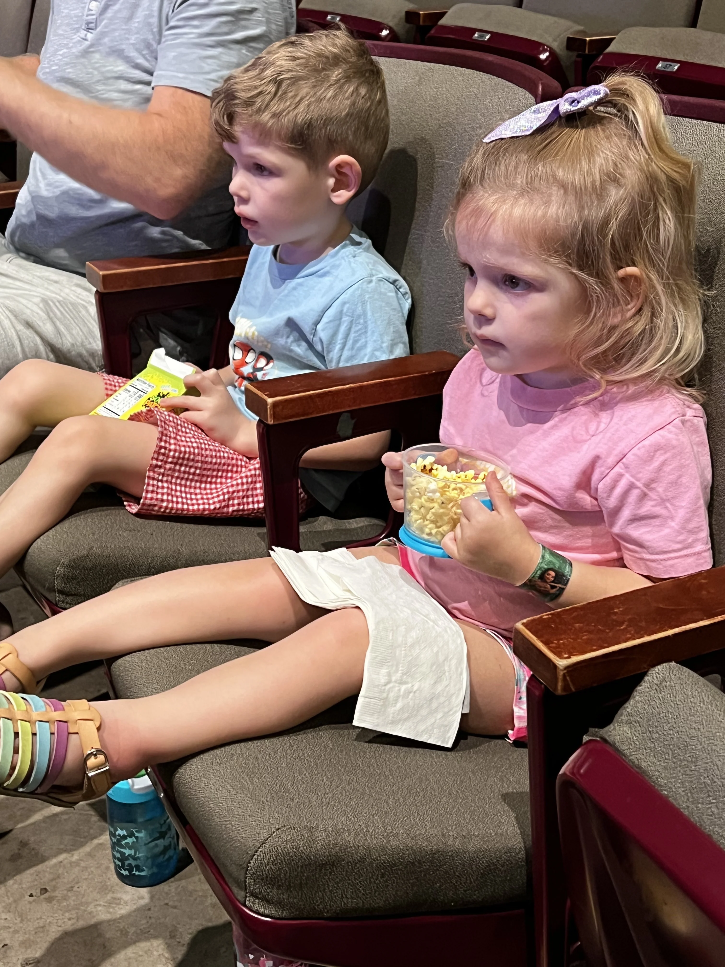 kids sitting at a disney junior live show