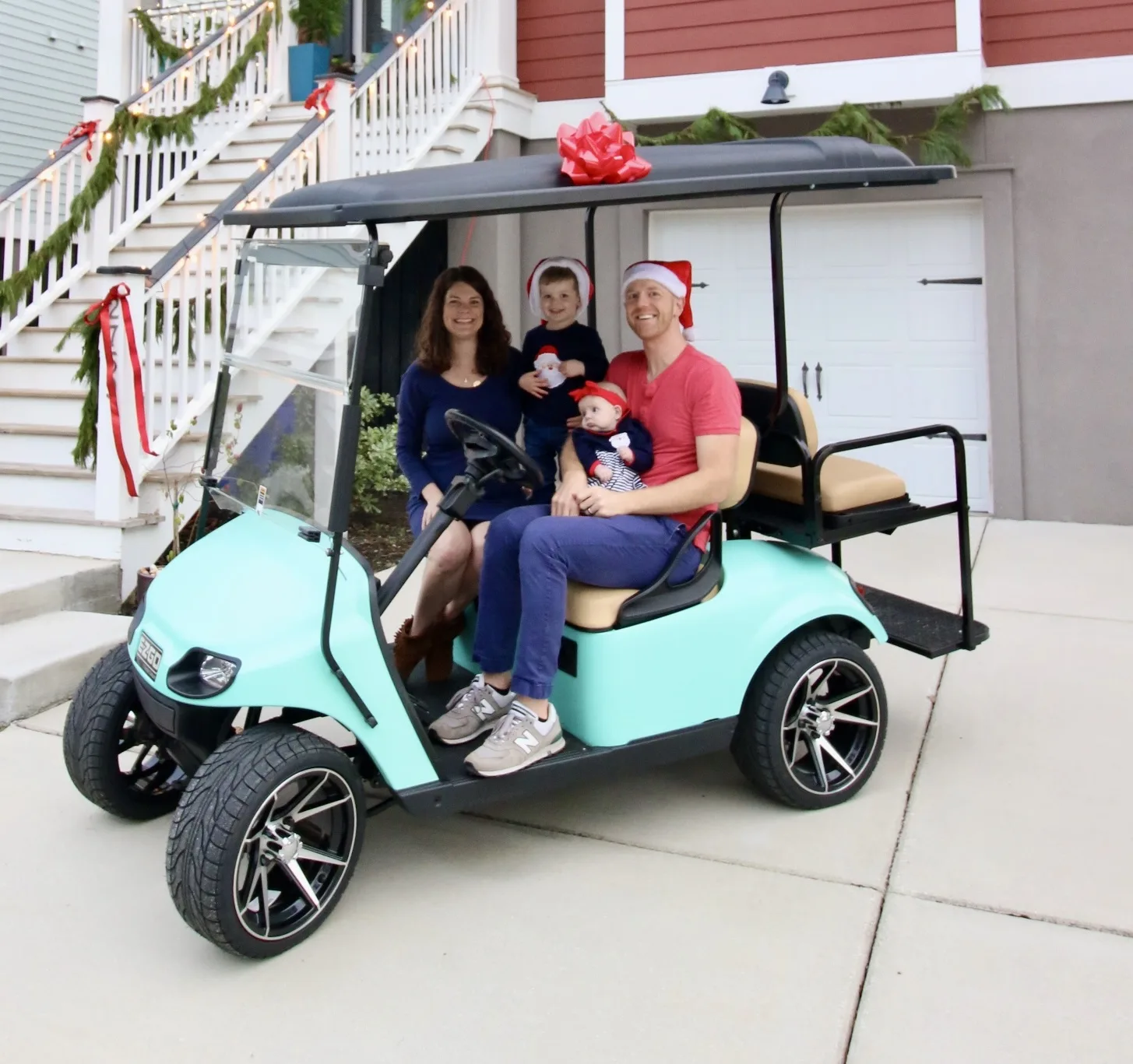 family on a golf cart