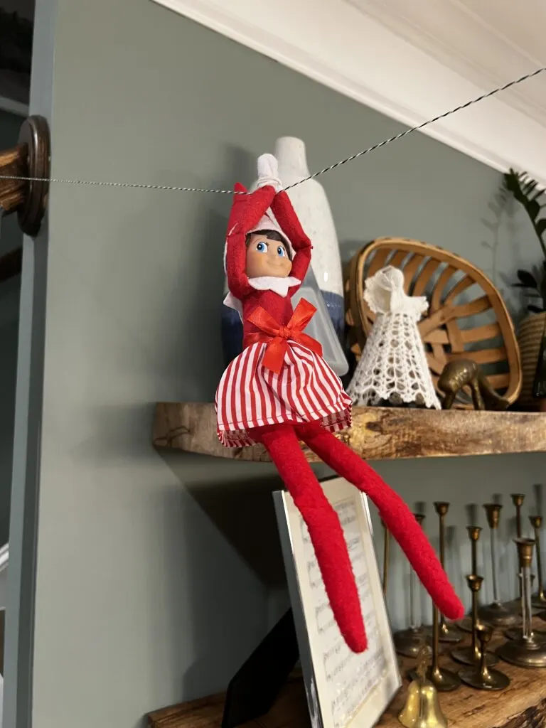 elf on the shelf on a zipline