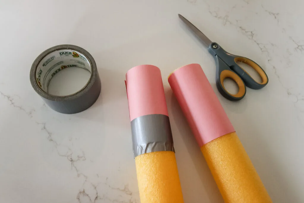 adding an eraser to an oversized pencil