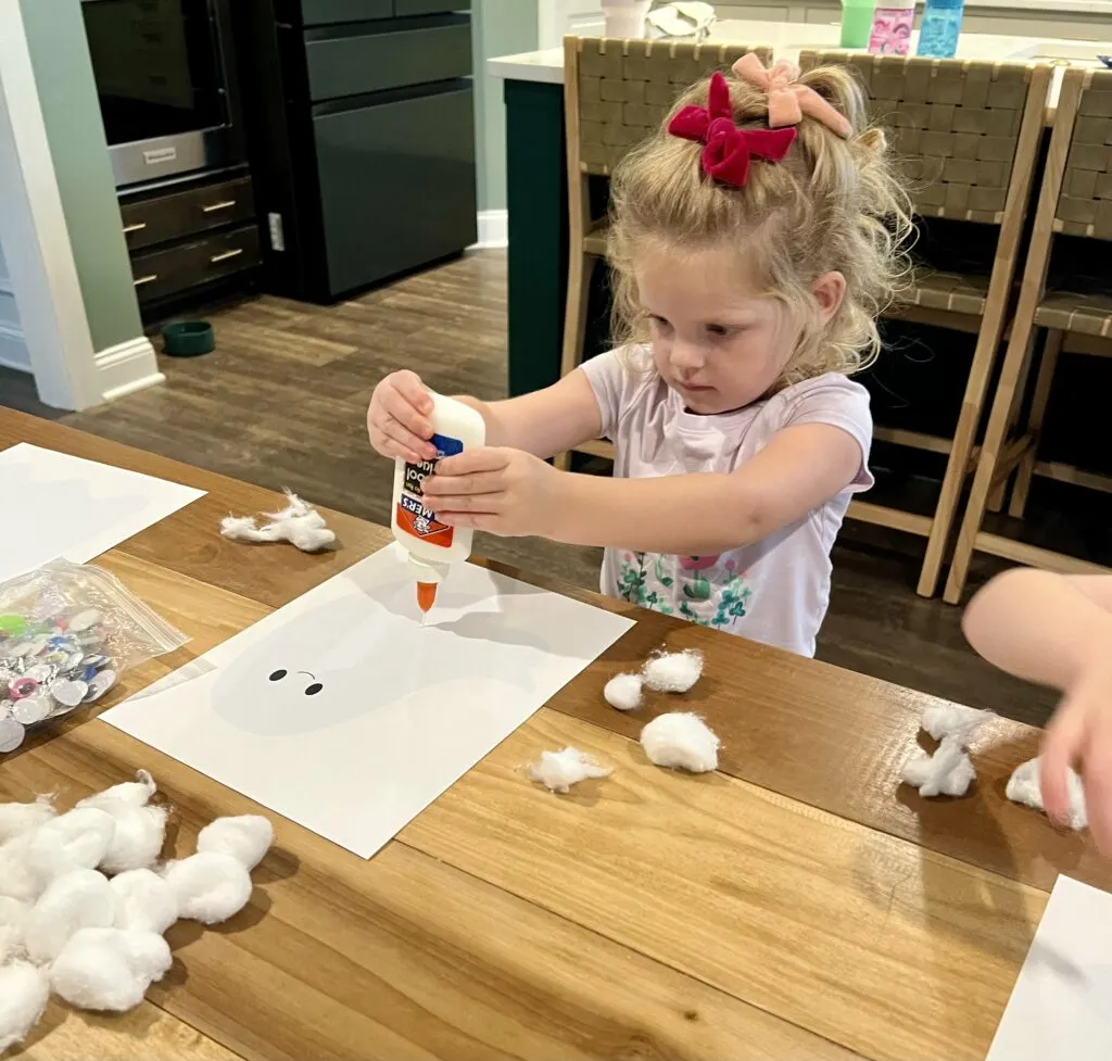 glueing on cotton ball ghost craft