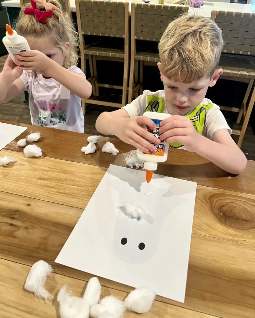 glueing on cotton ball ghost craft