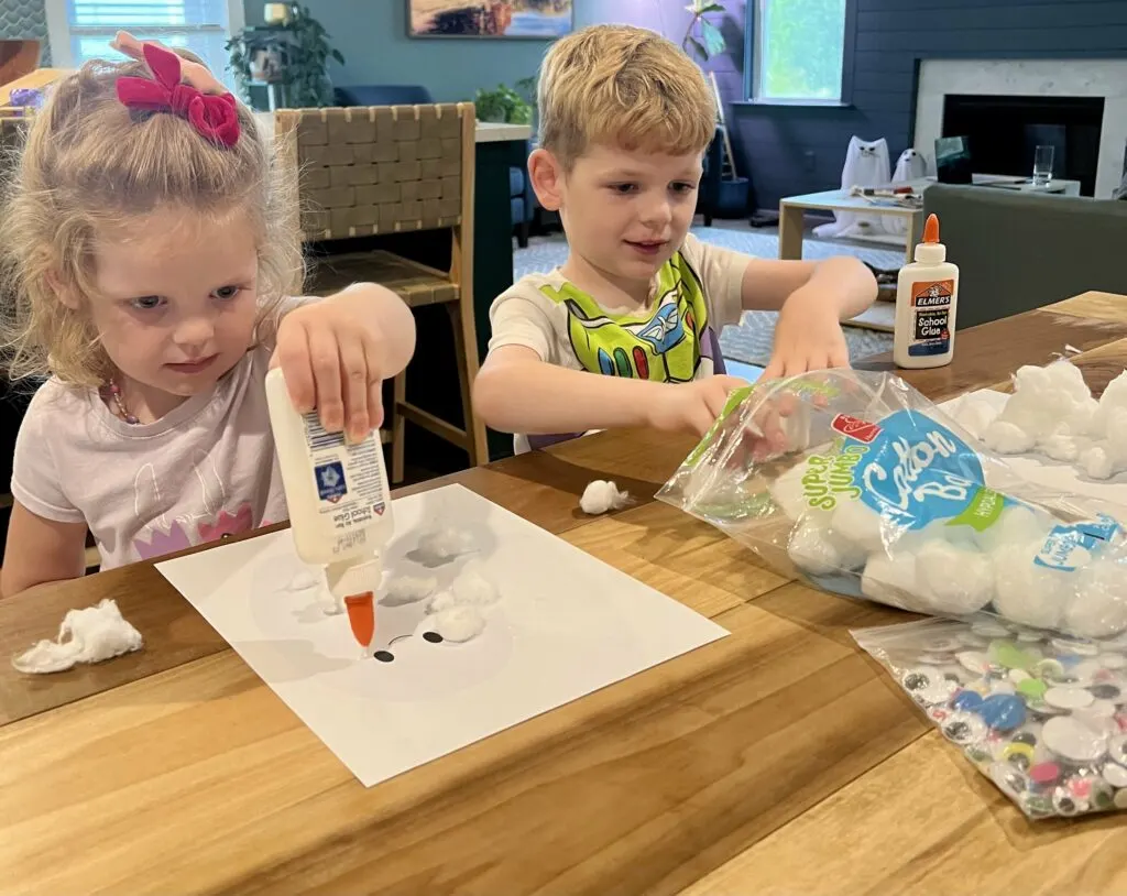 glueing on cotton ball ghost craft