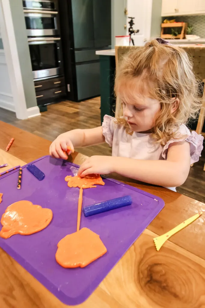 kids playing with candy corn play dough