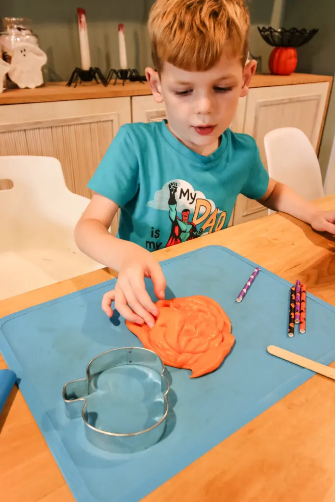 kids playing with candy corn play dough