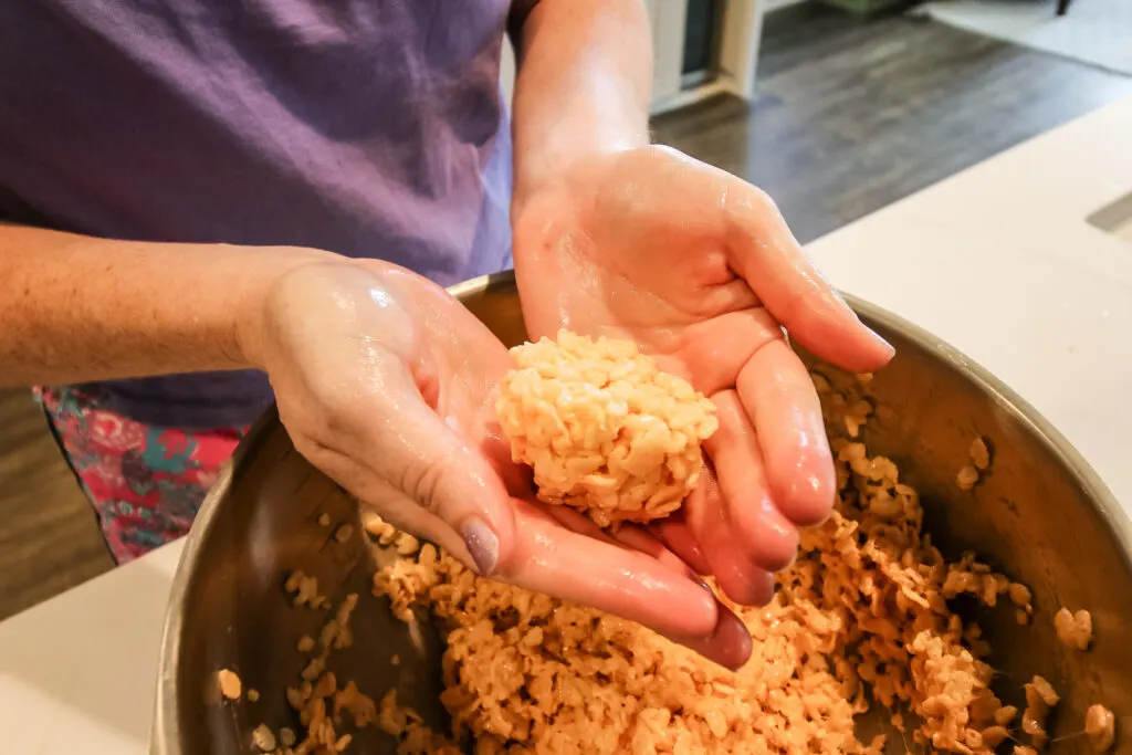 making rice crispy treat balls