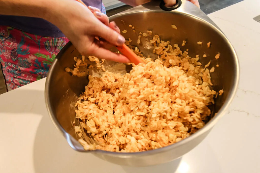 mixing rice crispy treats