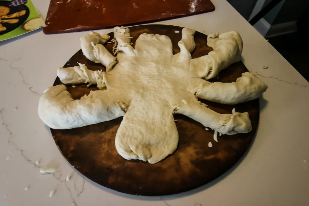 making a cheese bread spider for halloween