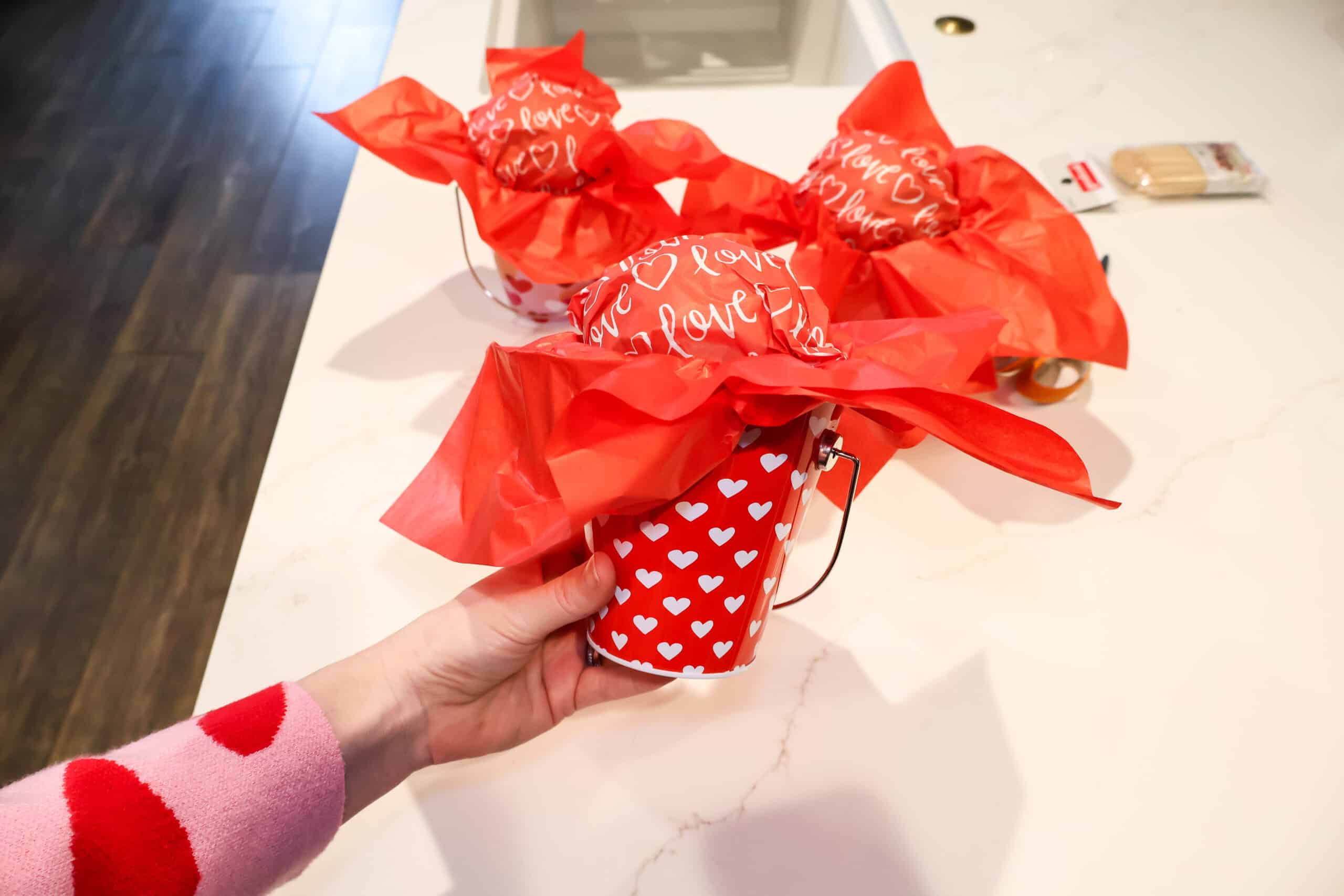 foam ball in a gift bucket with tissue paper