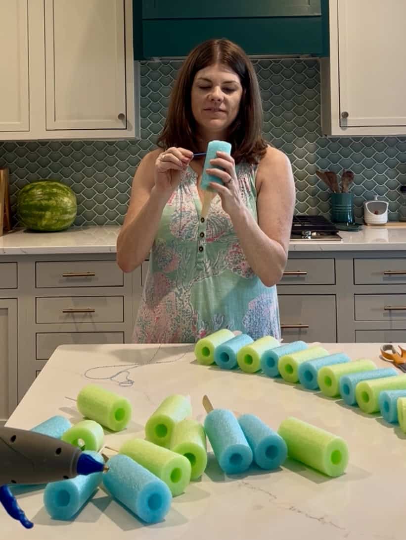 stringing pool noodle popsicles