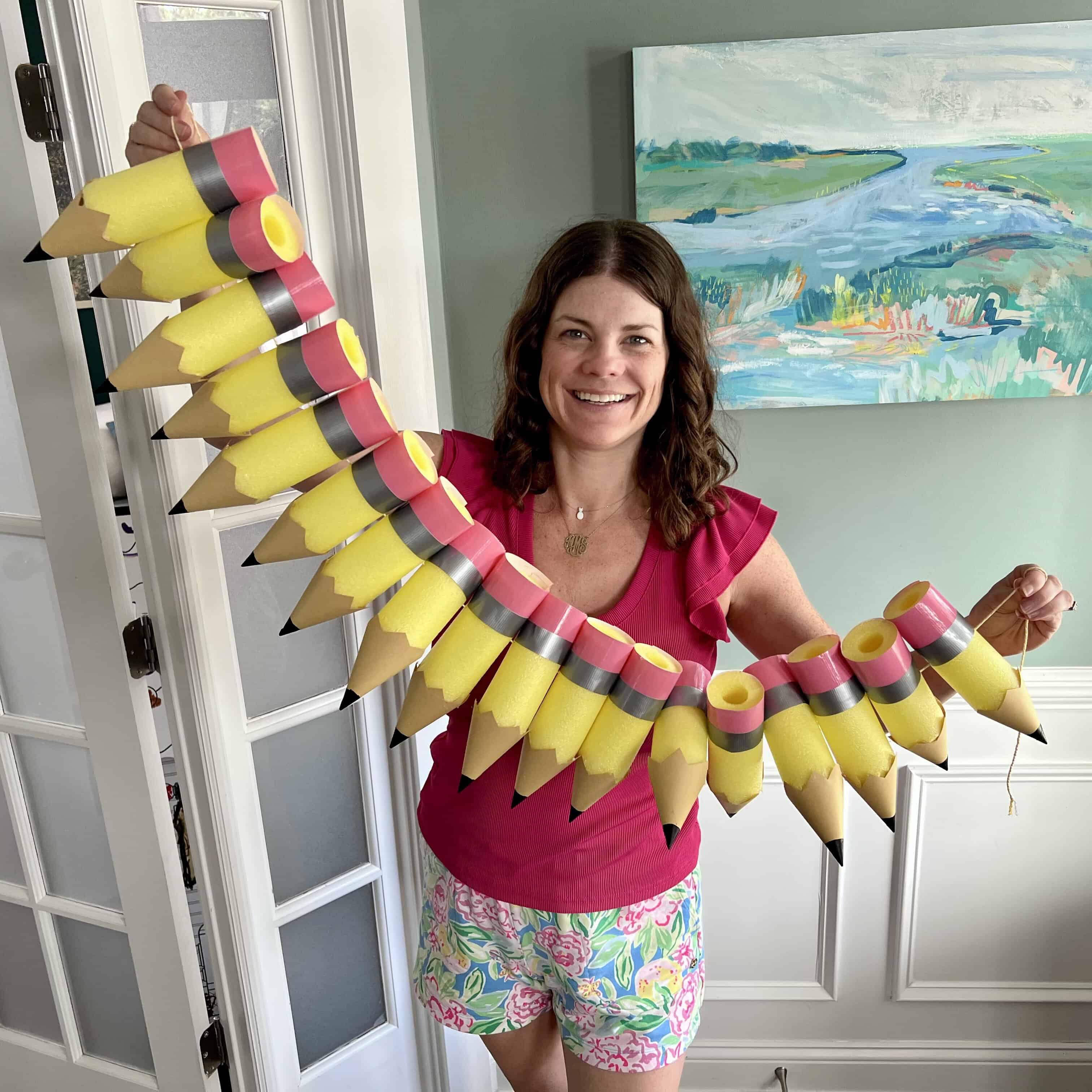 me with a pool noodle pencil garland