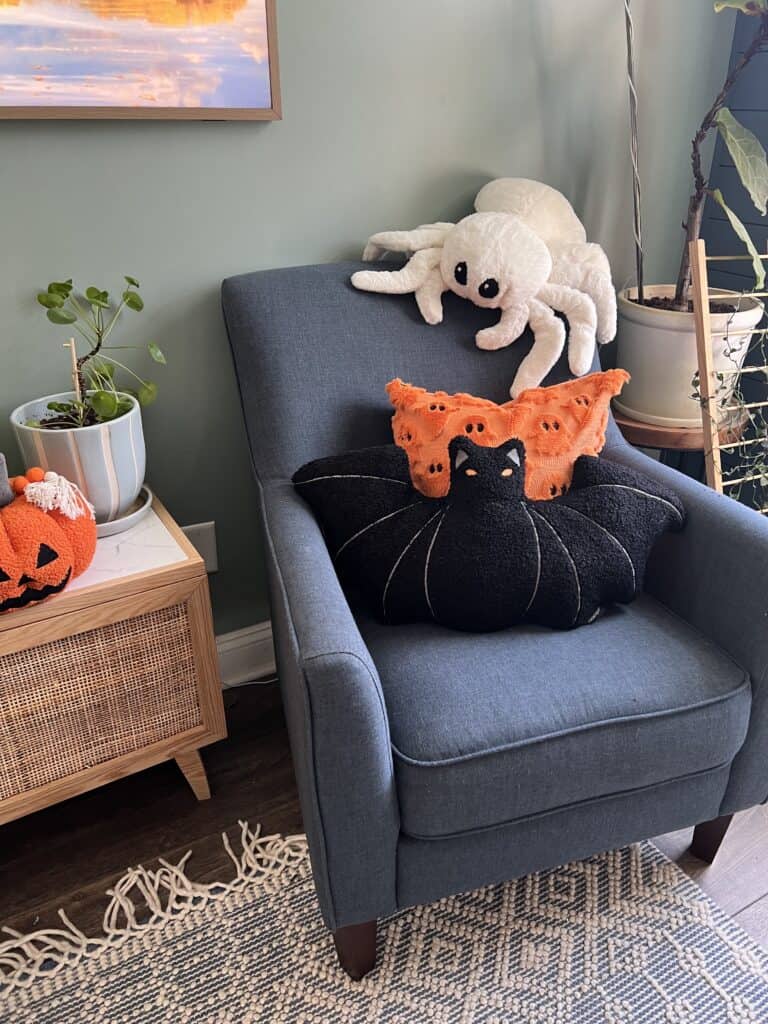halloween pillows on a chair