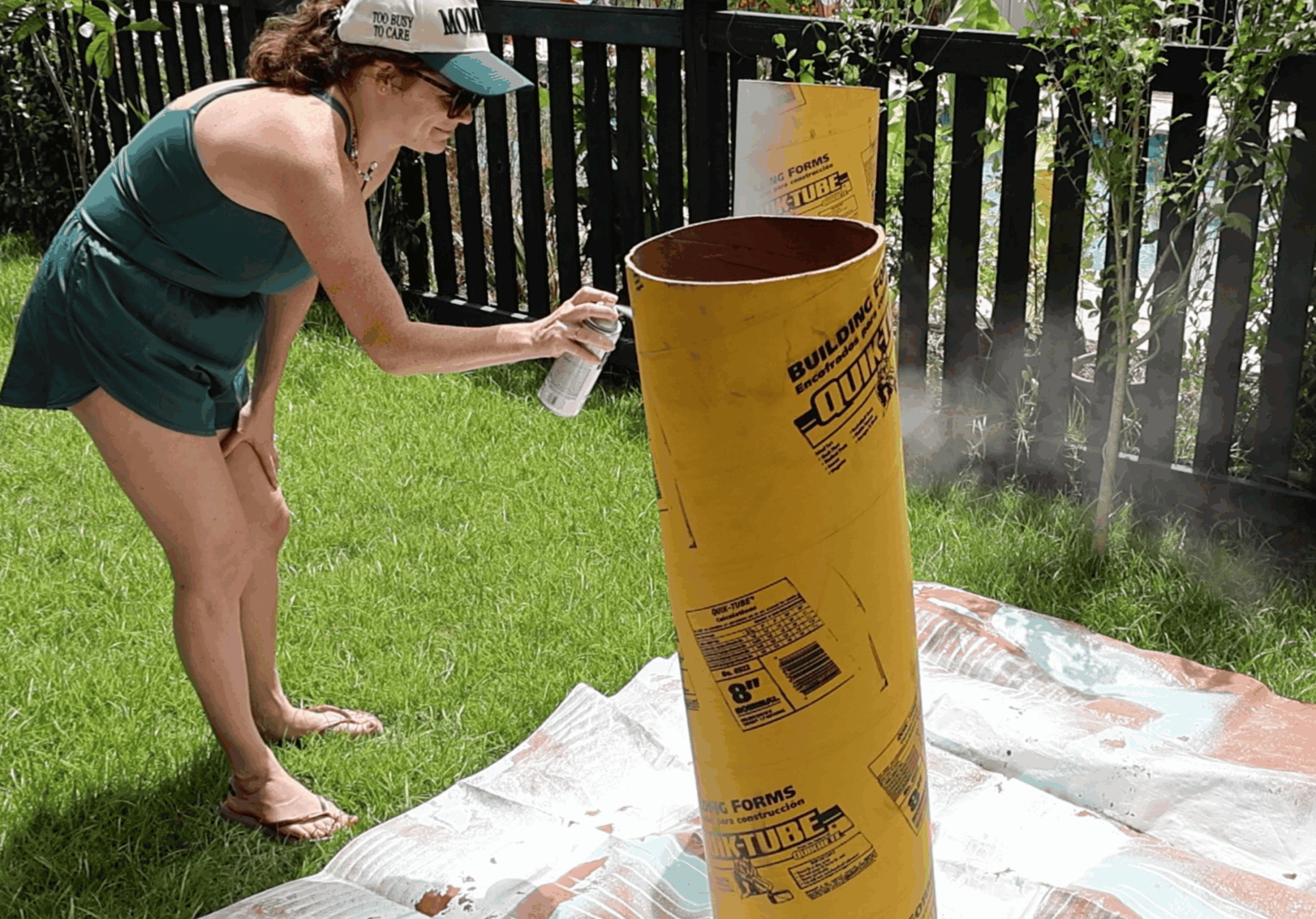 spray painting a cardboard tube