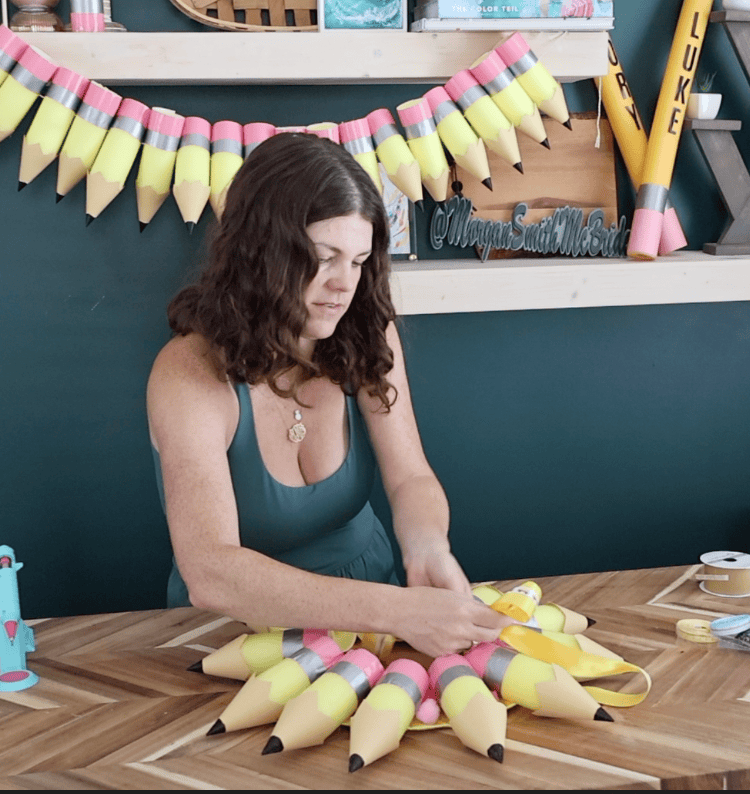 adding a hanger to a back to school wreath