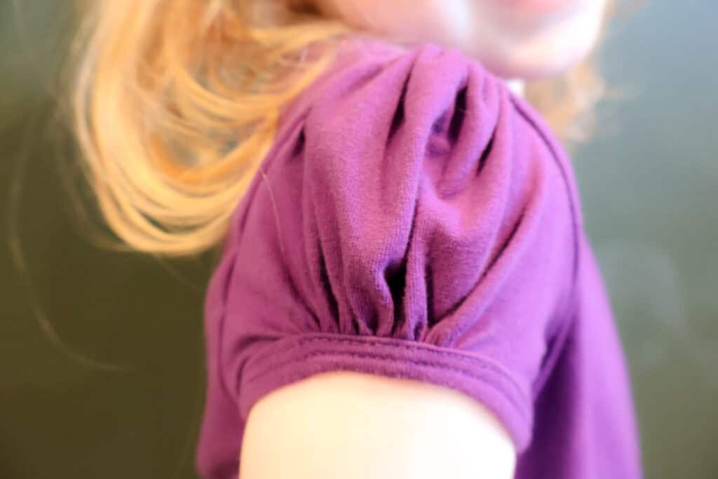 close up of puff sleeve lilax kids clothes