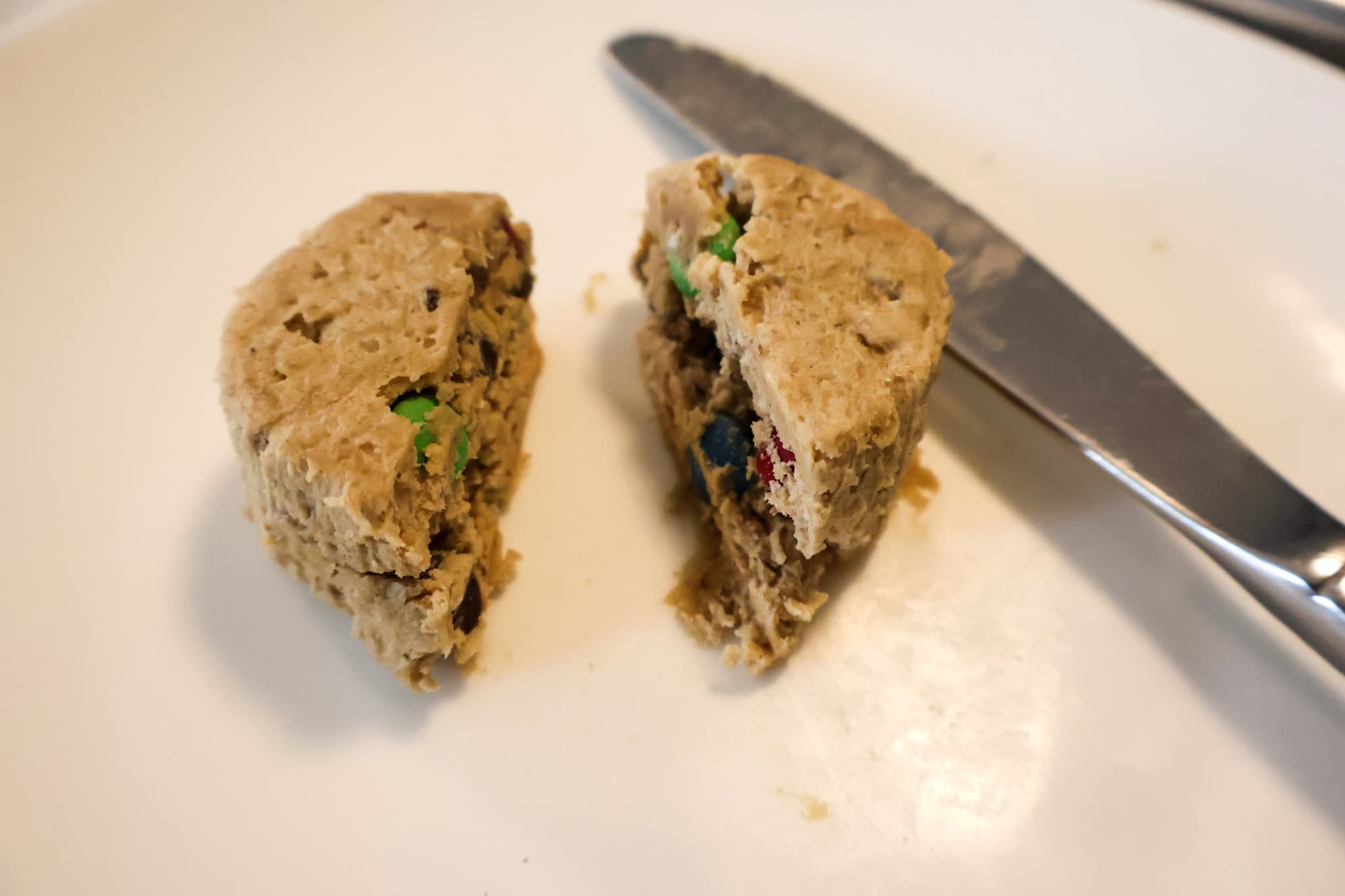 slicing cookie dough in half