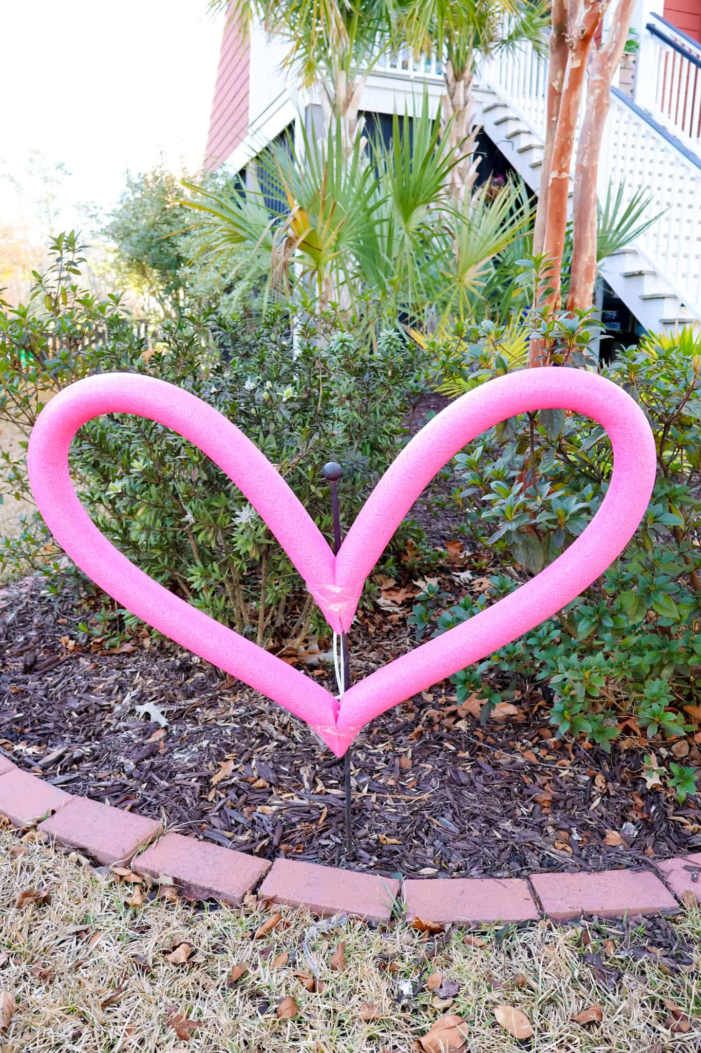 pool noodle heart in the yard