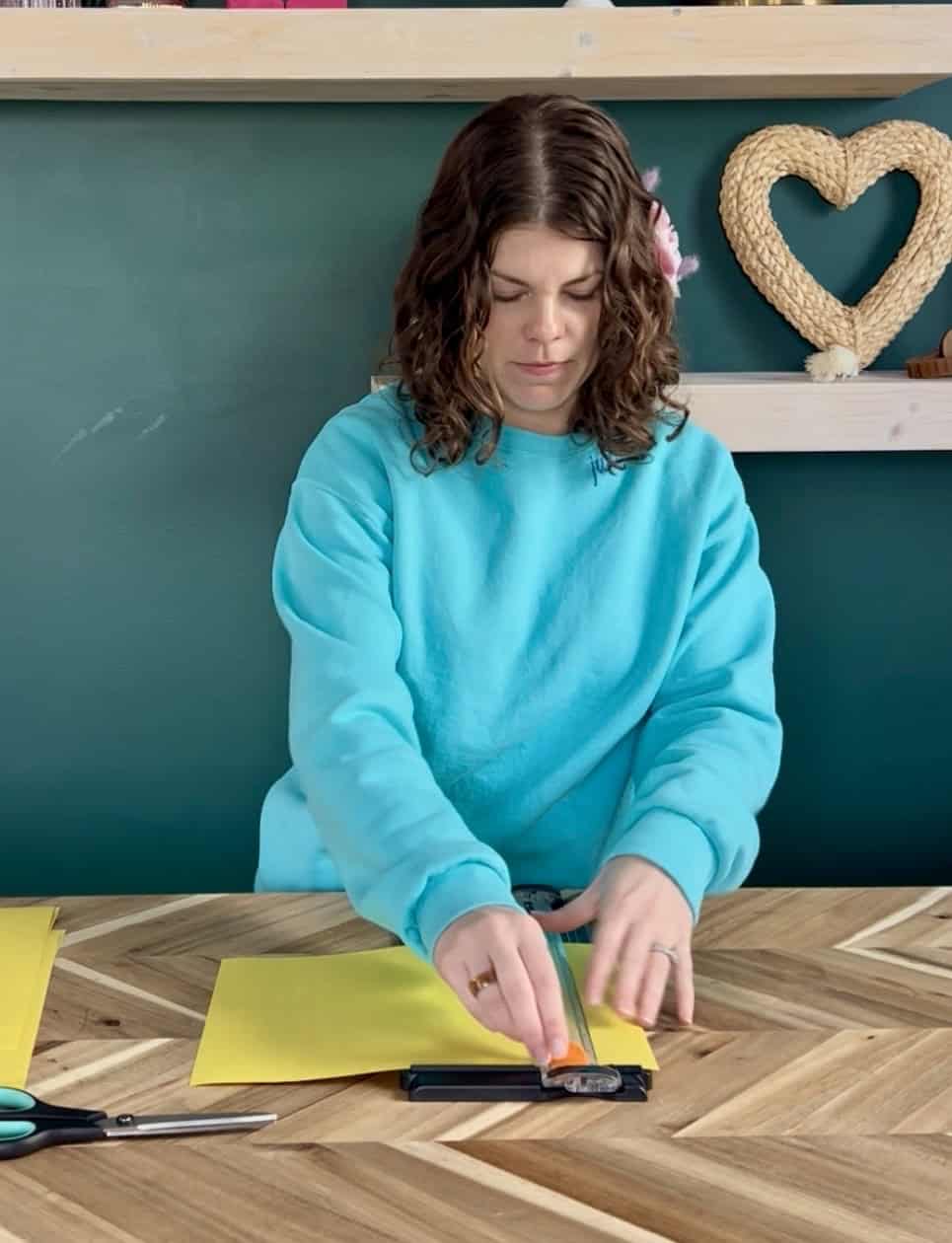 cutting yellow paper strips