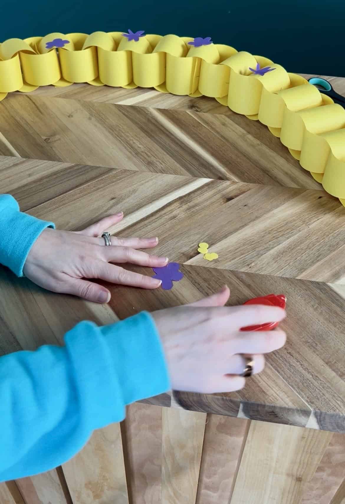 cutting and gluing paper flowers